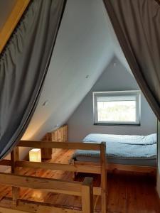 Ένα ή περισσότερα κρεβάτια σε δωμάτιο στο Domek Przysłop