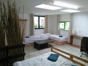 Posteľ alebo postele v izbe v ubytovaní Rastlinky.sk Greenhouse Guestrooms