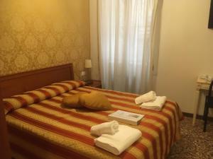 Postel nebo postele na pokoji v ubytování Casa Dolce