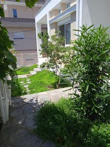 Vonkajšia záhrada v ubytovaní Kavala Home 2 + 7 fotografií