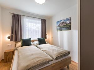 Posteľ alebo postele v izbe v ubytovaní Appartement Ortner