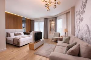 A television and/or entertainment centre at The Pearl Suites
