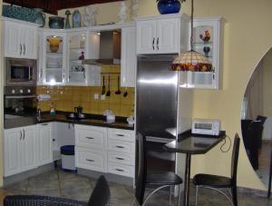 A kitchen or kitchenette at Holiday home to the street with big kitchen