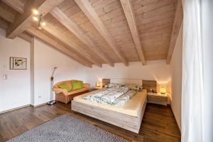 A bed or beds in a room at Panoramawohnung Annaheim