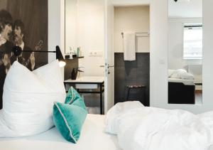 Ein Bett oder Betten in einem Zimmer der Unterkunft Pyjama Park St. Pauli