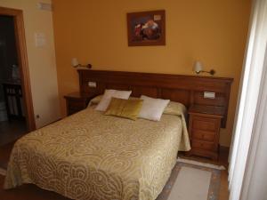 Postel nebo postele na pokoji v ubytování Hotel Las Torres