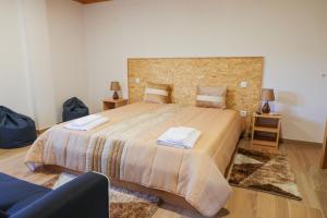 Кровать или кровати в номере Quinta dos Patos