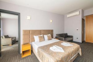 Postel nebo postele na pokoji v ubytování Taksim Hotel V Plus