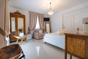 Postel nebo postele na pokoji v ubytování Villa Eleonora Paestum + 28 fotografií