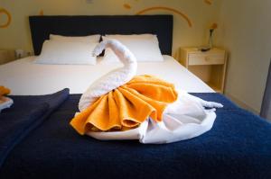 Postel nebo postele na pokoji v ubytování Hotel Tassos-Despina