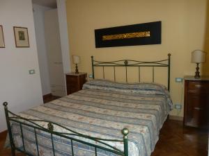 Postel nebo postele na pokoji v ubytování Casa Titty