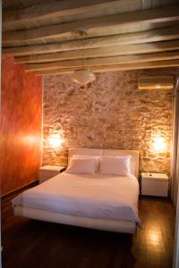 Postel nebo postele na pokoji v ubytování Skinos House