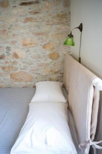 Postel nebo postele na pokoji v ubytování Skinos House