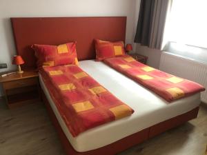 Ένα ή περισσότερα κρεβάτια σε δωμάτιο στο Apartments & Rooms Preseren