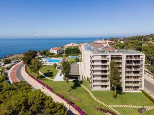 an aerial view of a hotel and the ocean at Vila Gale Cascais in Cascais