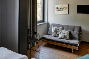 Posezení v ubytování Kröger by Underdog Hotels