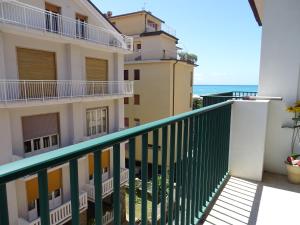 a balcony of a building with a view of the ocean at Casa Jacopo 50 mt dal mare in Levanto