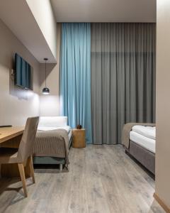 Ένα ή περισσότερα κρεβάτια σε δωμάτιο στο Hotel Vík í Mýrdal