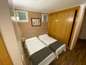 Voodi või voodid majutusasutuse Somriu Hotel Vall Ski toas