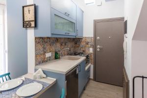 Kuchyňa alebo kuchynka v ubytovaní Rethymno Garden Suites + 20 fotografií