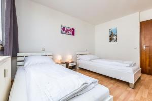 Work & stay apartment in Bergisch Gladbach Bensberg 객실 침대