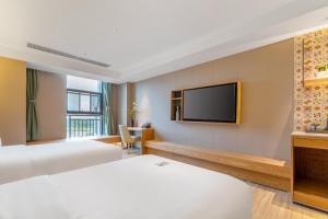 TRUE Go hotel客房内的一张或多张床位