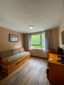 Voodi või voodid majutusasutuse Somriu Hotel Vall Ski toas