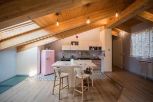 Kuchyň nebo kuchyňský kout v ubytování Loft 29 mansardato con ampio terrazzo