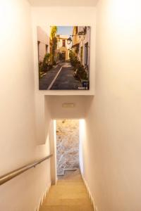 Televízia a/alebo spoločenská miestnosť v ubytovaní Rethymno Garden Suites