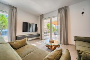 TV a/nebo společenská místnost v ubytování Liberty Living Apartments