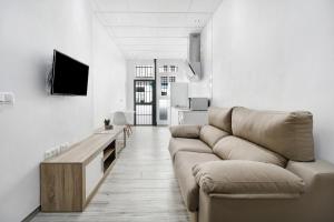 Telewizja i/lub zestaw kina domowego w obiekcie Apartamento Venus 1