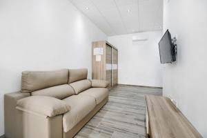 Telewizja i/lub zestaw kina domowego w obiekcie Apartamento Venus 1