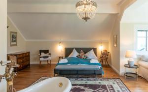 A bed or beds in a room at Bergvilla Oberon