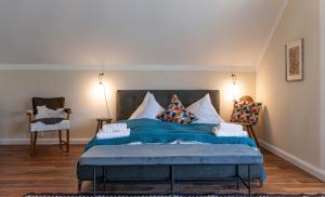 A bed or beds in a room at Bergvilla Oberon