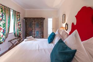 A bed or beds in a room at Bergvilla Oberon