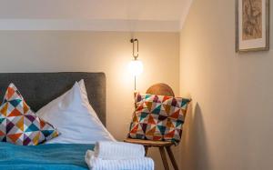 A bed or beds in a room at Bergvilla Oberon