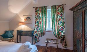 A bed or beds in a room at Bergvilla Oberon