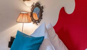 A bed or beds in a room at Bergvilla Oberon