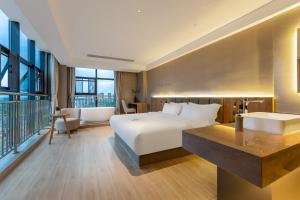 TRUE Go hotel客房内的一张或多张床位