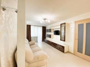 Televízia a/alebo spoločenská miestnosť v ubytovaní Beautiful 1-bedroom near Most City Center