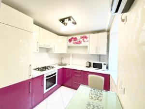 Kuchyňa alebo kuchynka v ubytovaní Beautiful 1-bedroom near Most City Center