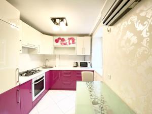 Kuchyňa alebo kuchynka v ubytovaní Beautiful 1-bedroom near Most City Center