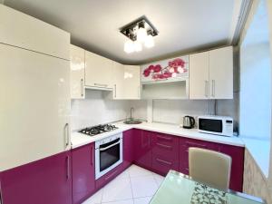 Kuchyňa alebo kuchynka v ubytovaní Beautiful 1-bedroom near Most City Center