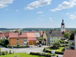 a view of a town with a church at FeWo Royal & Goodness Home in Mühlhausen