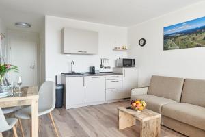 Kuchyň nebo kuchyňský kout v ubytování Smart Resorts Haus Brilliant Ferienwohnung 609