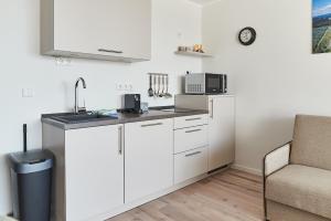 Kuchyň nebo kuchyňský kout v ubytování Smart Resorts Haus Brilliant Ferienwohnung 609 + 7 fotografií