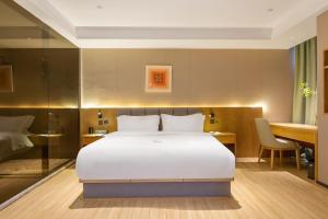 TRUE Go hotel客房内的一张或多张床位