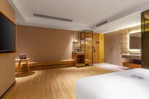 TRUE Go hotel客房内的一张或多张床位