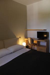 Кровать или кровати в номере Hotel Torre Domini
