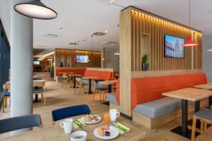 Holiday Inn Express - Goettingen, an IHG Hotel tesisinde bir oturma alanı